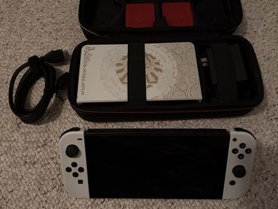 Nintendo Switch OLED with LoZ Dock, Hardcase, 128 GB SD card, HDMI, and charging cable
