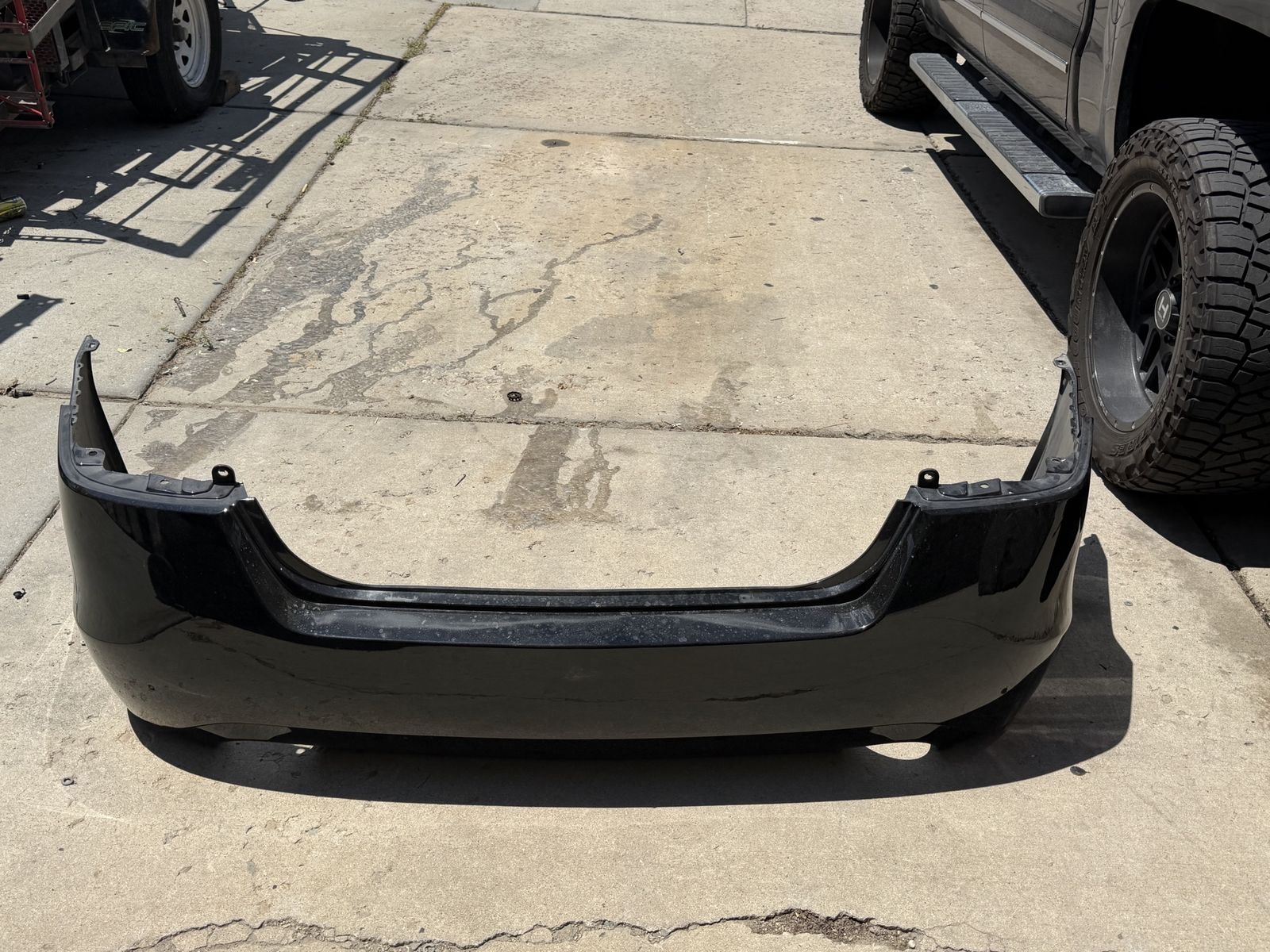 2013 Nissan Altima rear bumper black