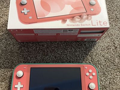 Nintendo Switch Lite Coral Handheld Console with Original Box