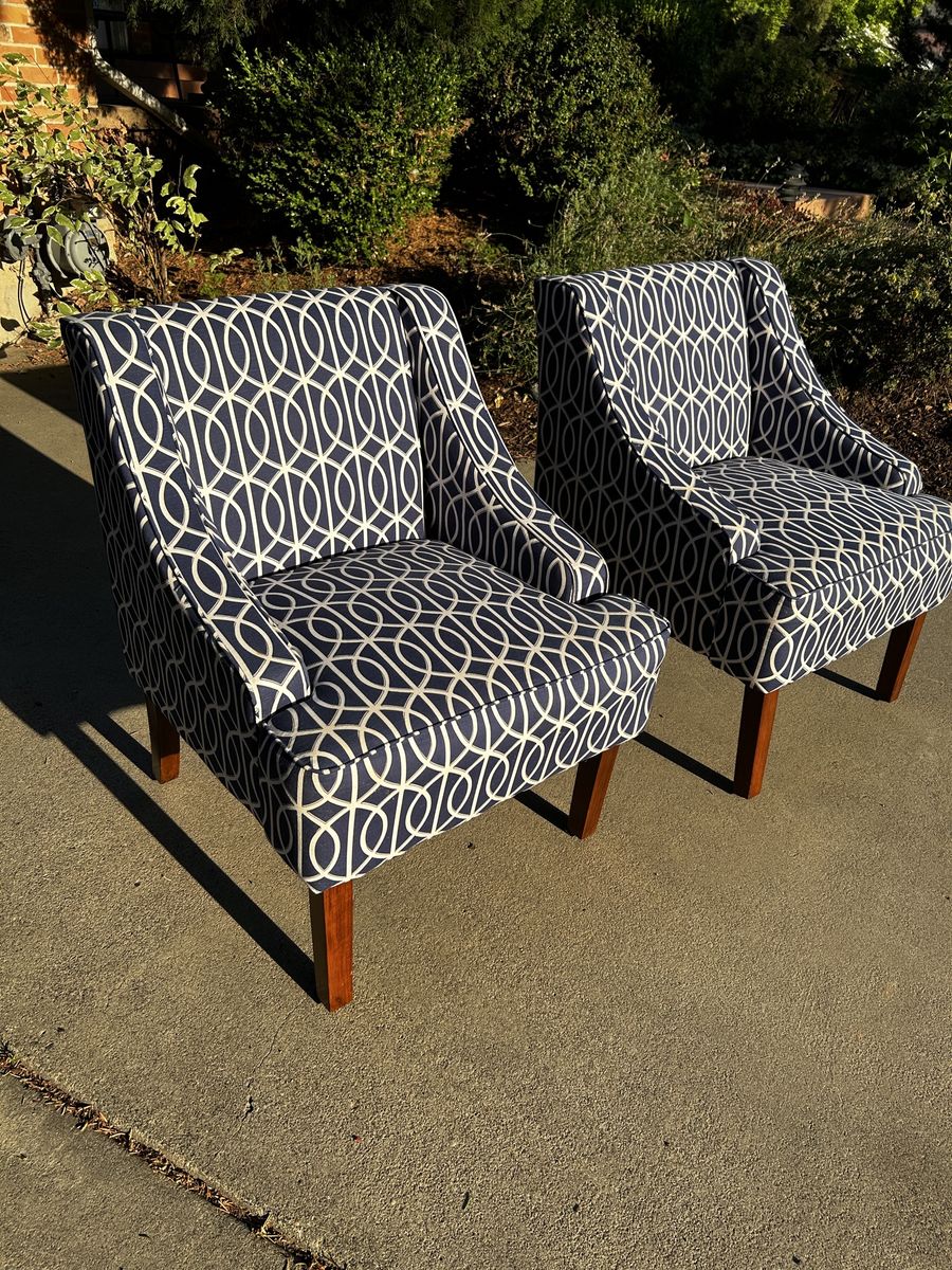 Pair of Navy Blue and White Patterned Accent Chairs with Wooden Legs