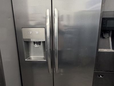 Frigidaire Gallery Stainless Steel Side-by-Side Refrigerator with Water and Ice Dispenser