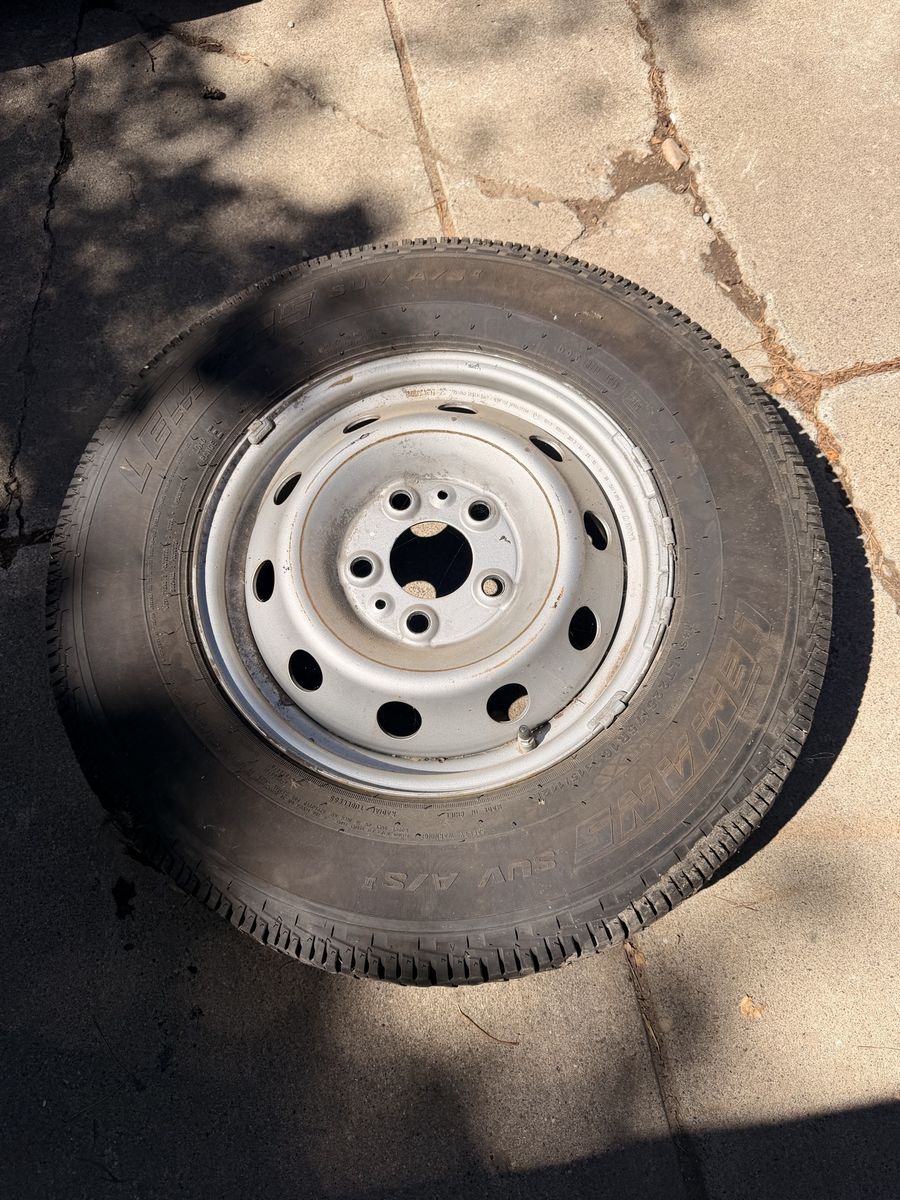 Free wheel and tire 225/75-16
