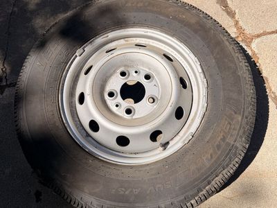 Free wheel and tire 225/75-16