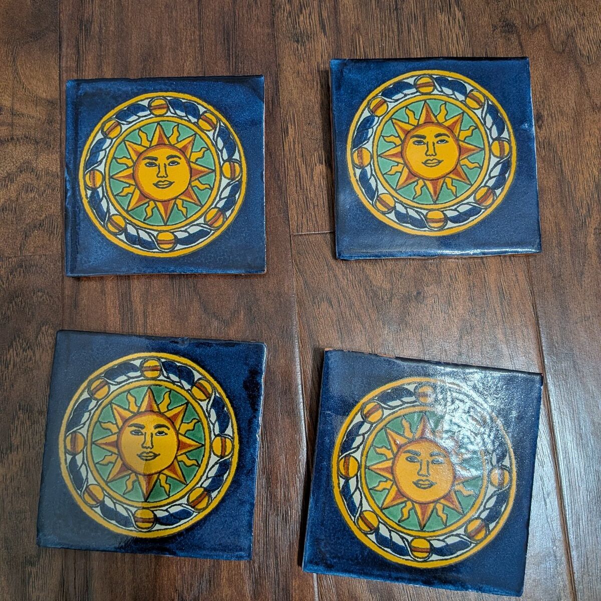 Hand painted Mexican sun tile wall hangings