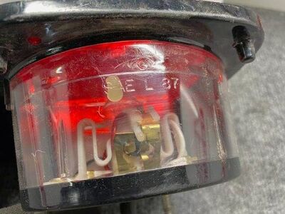Used Left Stop Tail Turn Lamp, Red, Part # 55-9973