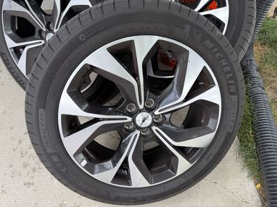 Individual Mustang Mach E 19" wheels w/Michelin Primacy A/C tires, perfect as a full-size spare, new tire bag included