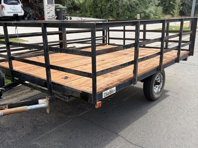 Single Axle Utility Trailer with Wooden Deck and Spare Tire