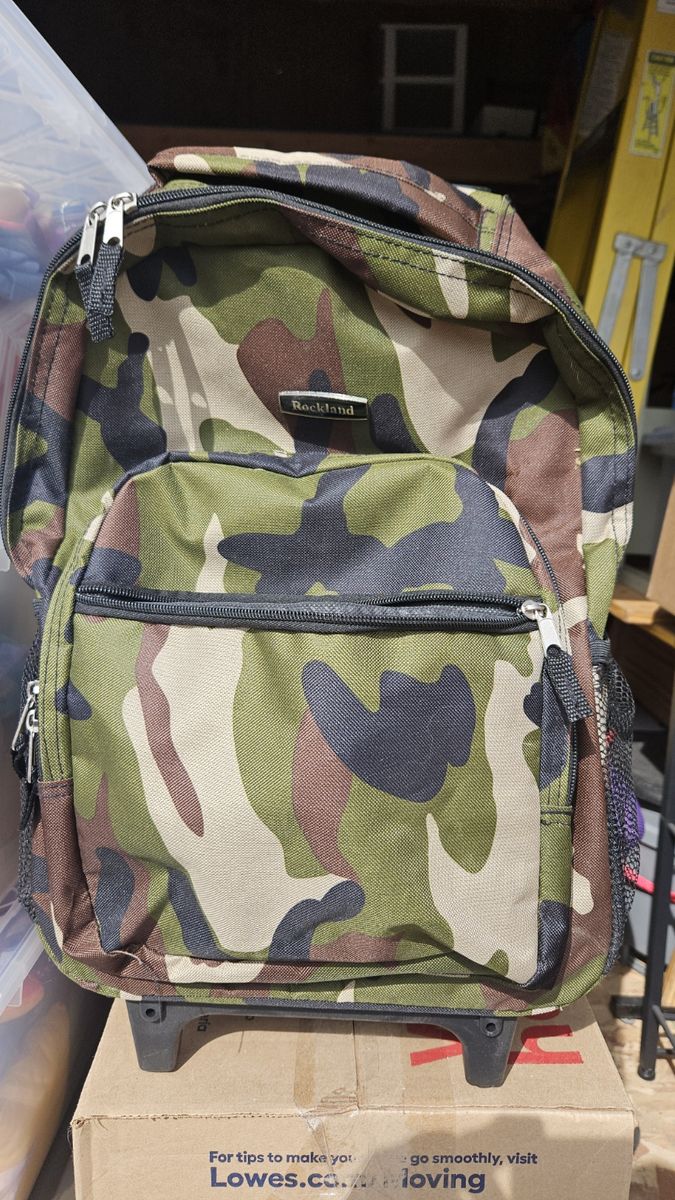 17 Inch dbl handle rolling backpack in camouflage.