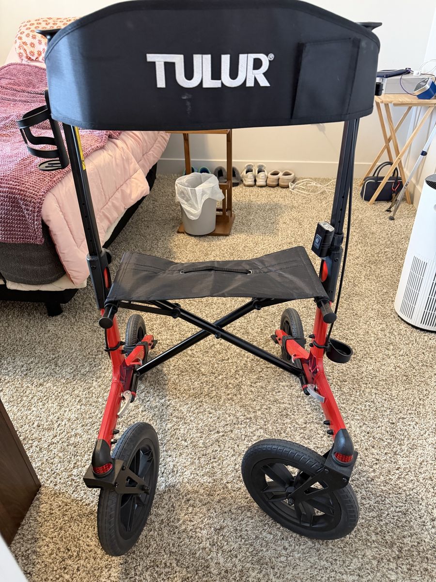 Walker with seat for sale.