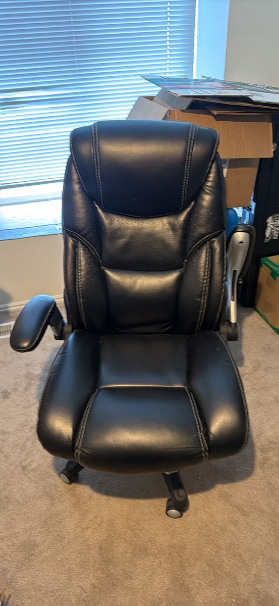 Black Leather Executive Office Chair with Wheels and Padded Armrests