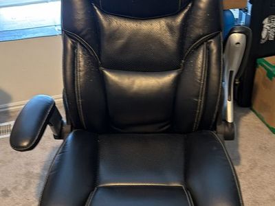 Black Leather Executive Office Chair with Wheels and Padded Armrests