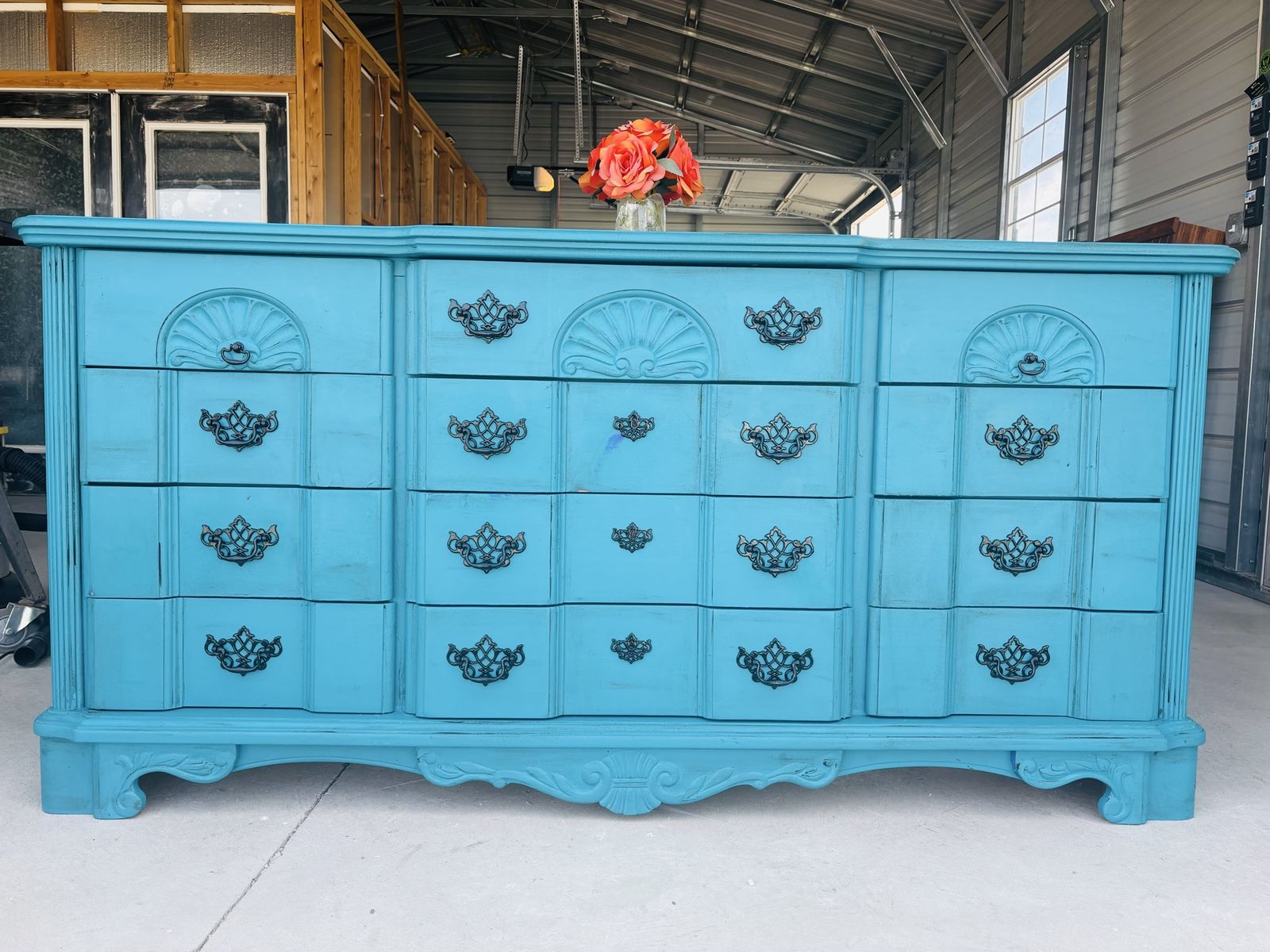 Elegant teal antiques dresser