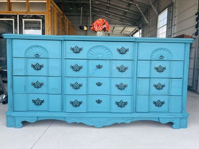 Elegant teal antiques dresser