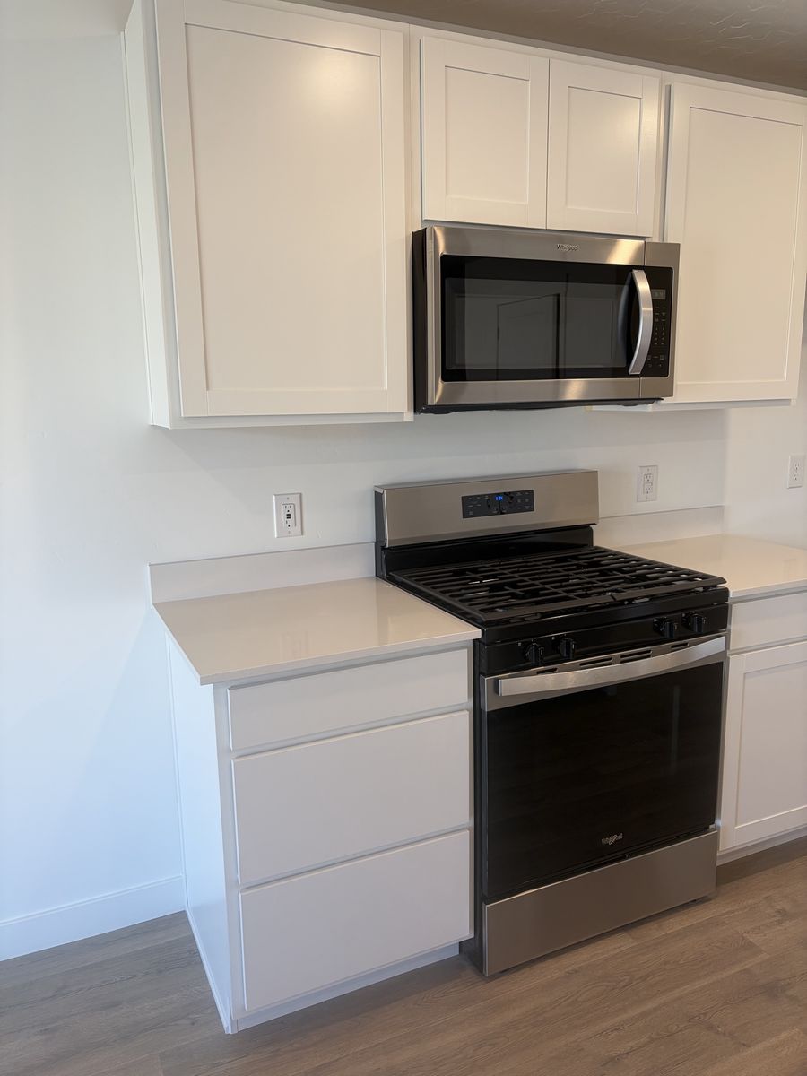 New Whirlpool Gas Range + OTR Microwave