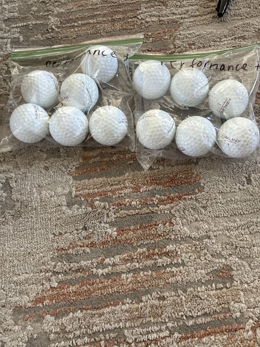 Dozen Kirkland performance + golf balls