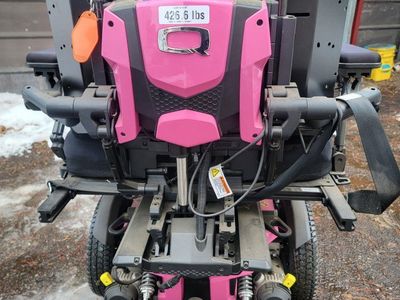 Quantum Edge HD Pink Electric Power Wheelchair with Stealth Products Cushion