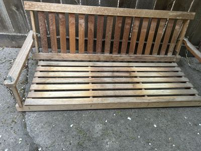 Wooden porch swing