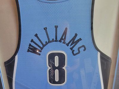 Herron Williams Autographed Jersey
