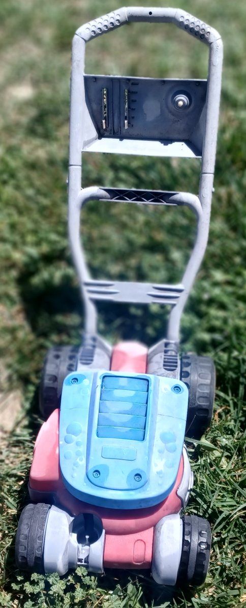 VERY CUTE WELL LOVED LAWN MOWER!