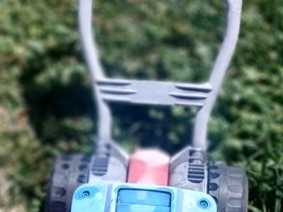 VERY CUTE WELL LOVED LAWN MOWER!