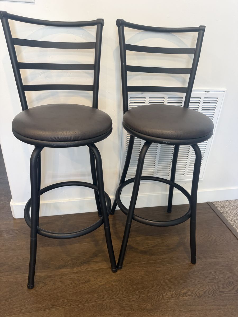 Set of 2 Black Metal Swivel Bar Stools with Padded Faux Leather Seats