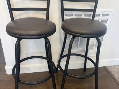 Set of 2 Black Metal Swivel Bar Stools with Padded Faux Leather Seats