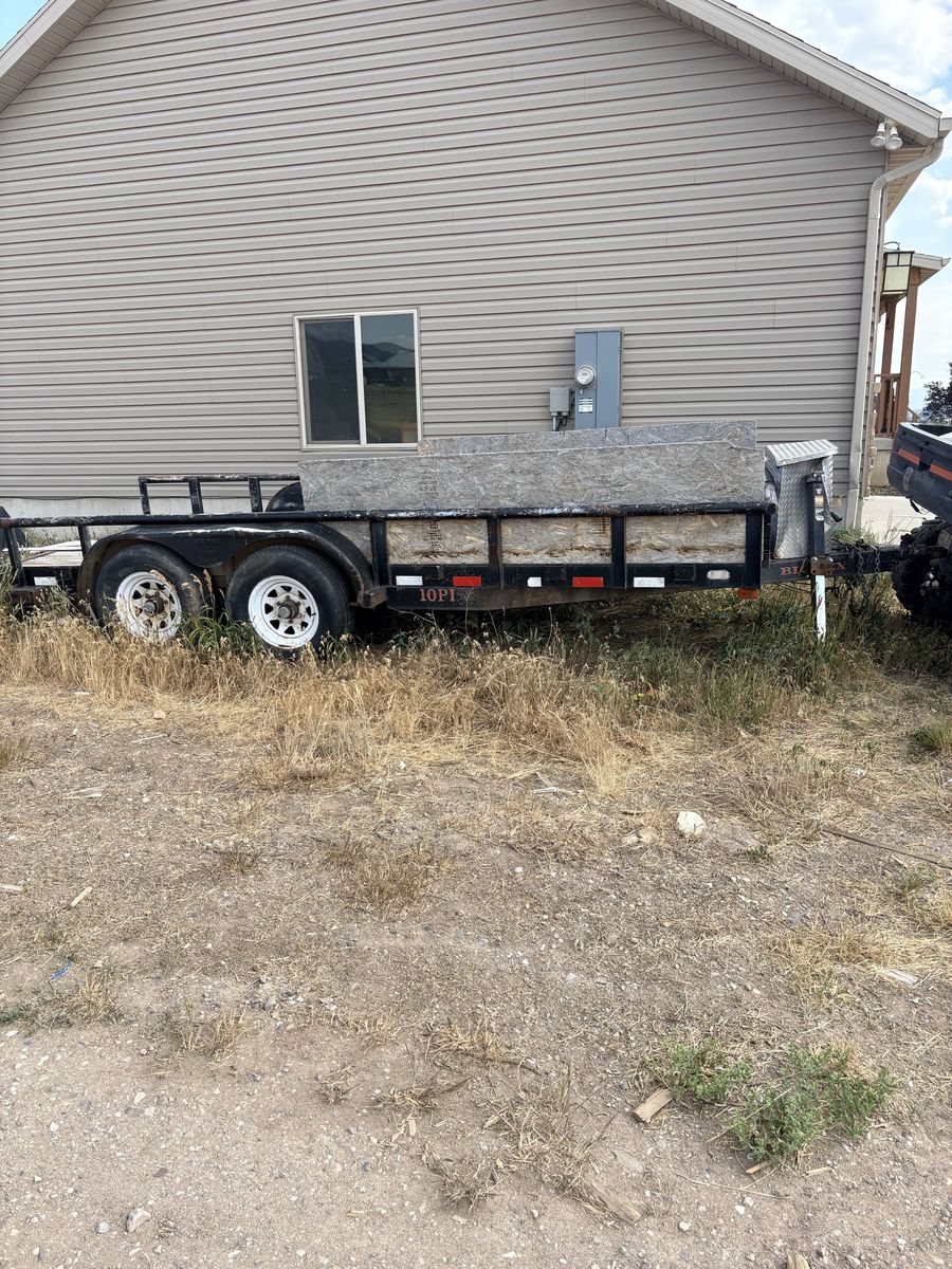 Flat bed trailer heavy duty good tires may need s little work o. Wiring for lights and brakes has ramps wa used to haul skid st