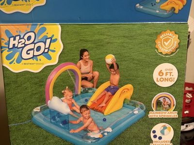 H2O GO! Rainbows 'N Rays Inflatable Play Center with Slide and Sprinkler