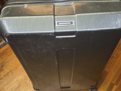 Large samsonite rolling suitcase