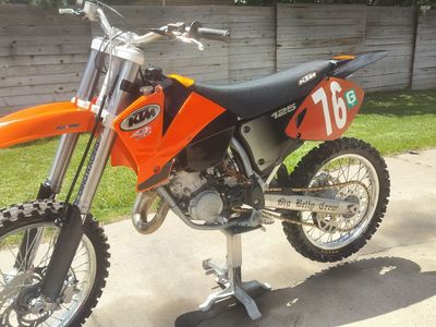 KTM 125 SX Dirt Bike - Orange/Black, #76