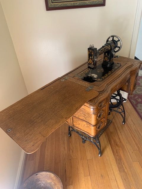 Treadle (nonelectric) sewing machine with accessories