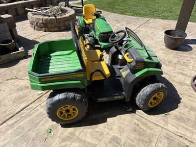 John Deere Gator XUV 12-Volt Ride-On Toy with Dump Bed & John Deere Tractor 12-Volt Ride-On Toy