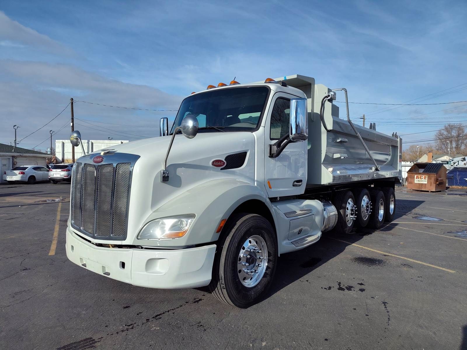 2017 PETERBILT 579 Quad Axle Dump Truck - NEW 20' Dump Body - Lift Axles Tarping System with Speader, Chain Lockers, and more!