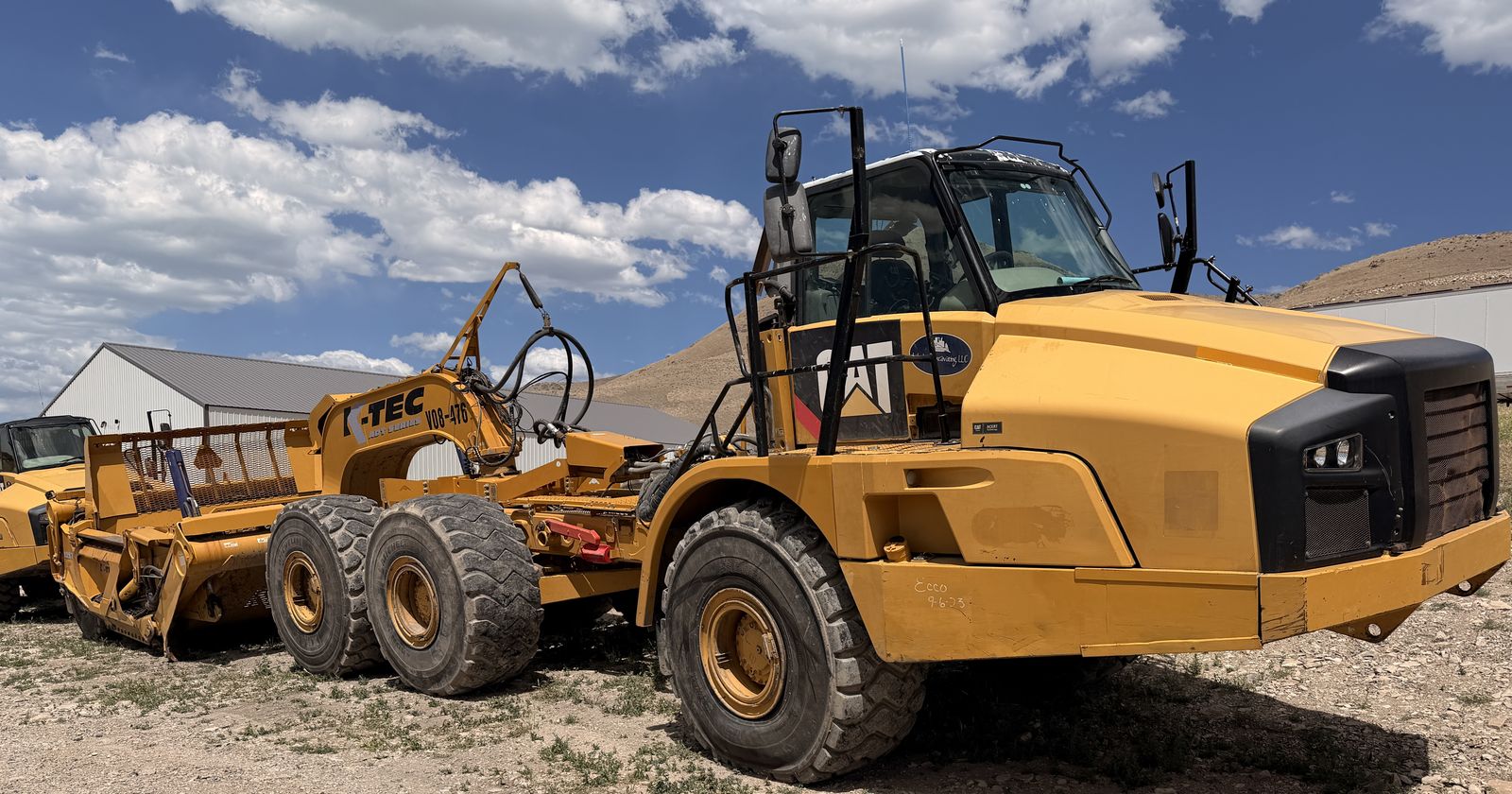 Caterpillar  740B, articulated dump truck with KTec Scraper