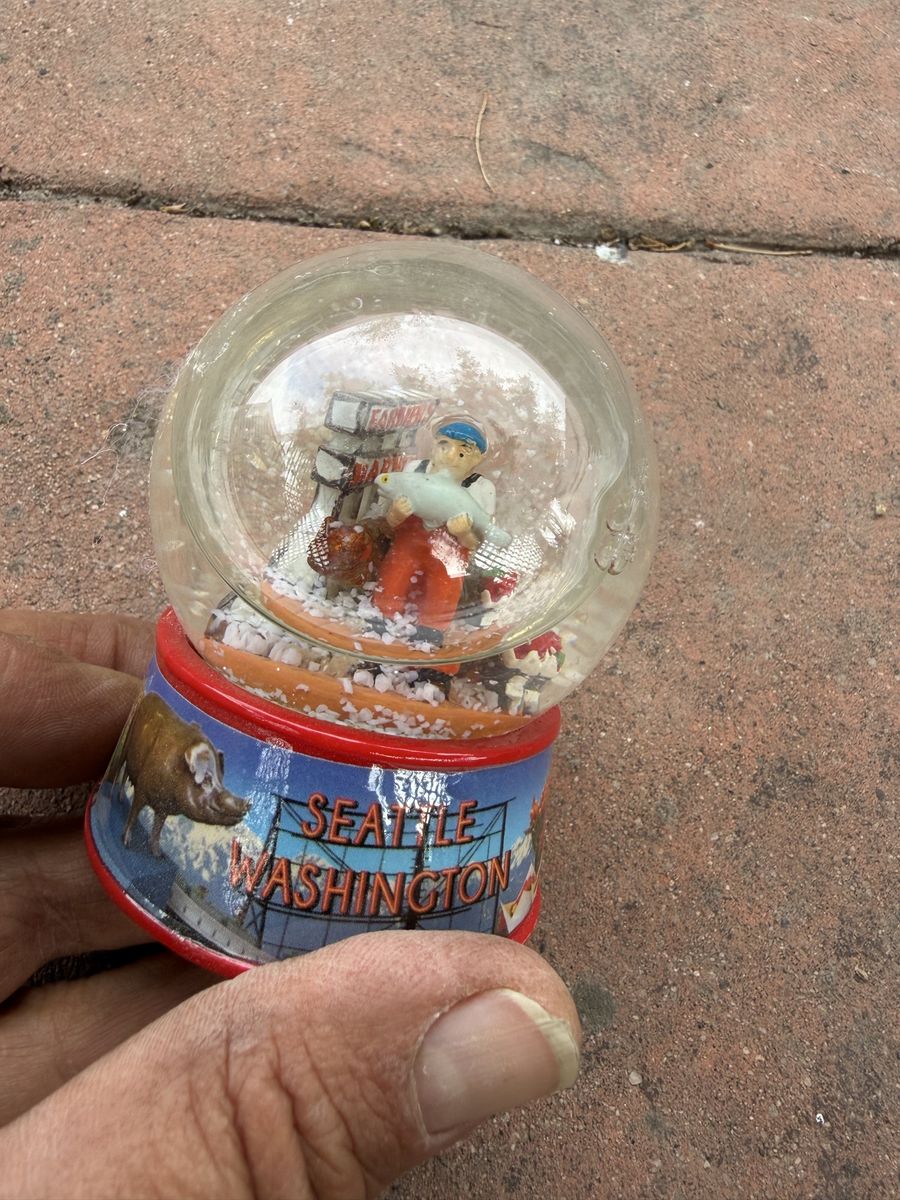 Seattle Washington Souvenir Snow Globe with Fisher figurine and Pike Place Market design