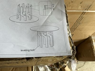 Round Glass Dining Table with Sculptural Dark