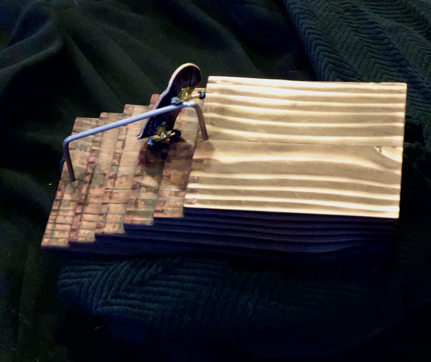 Fingerboard stair obstacle.