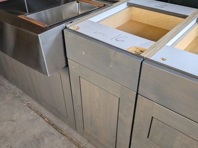 Gray Shaker Kitchen Cabinets with Stainless Steel Farmhouse Sink. we have granite and quartz countertops available