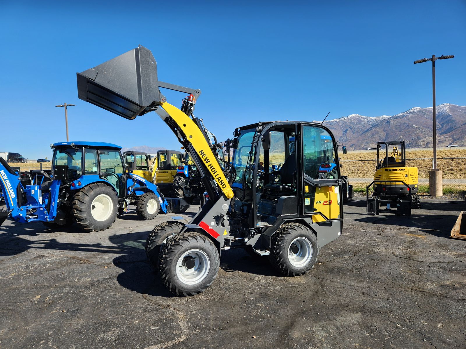 New Holland small articulated loader $59,999