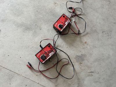 Two quick change battery chargers