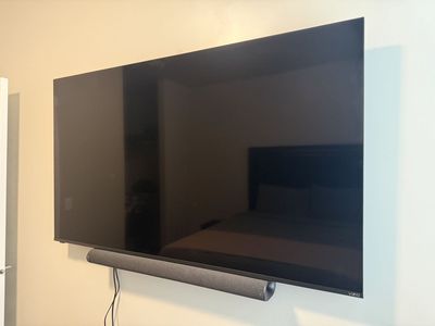Vizio 65” Smart LED TV with Soundbar Wall Mounted