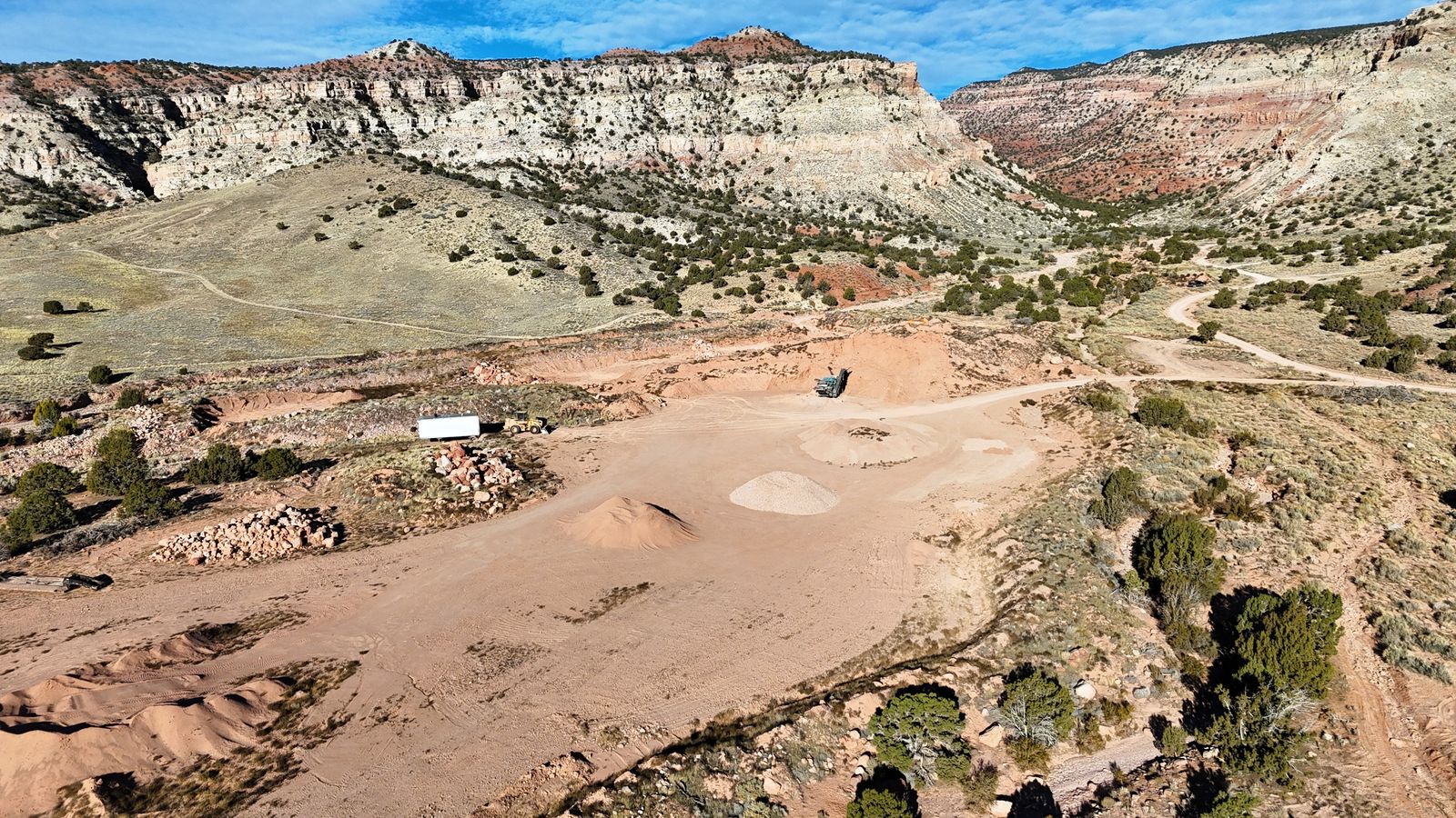 54 acres with gravel resources, varied rock products, power nearby, and negotiable acreage and water rights.