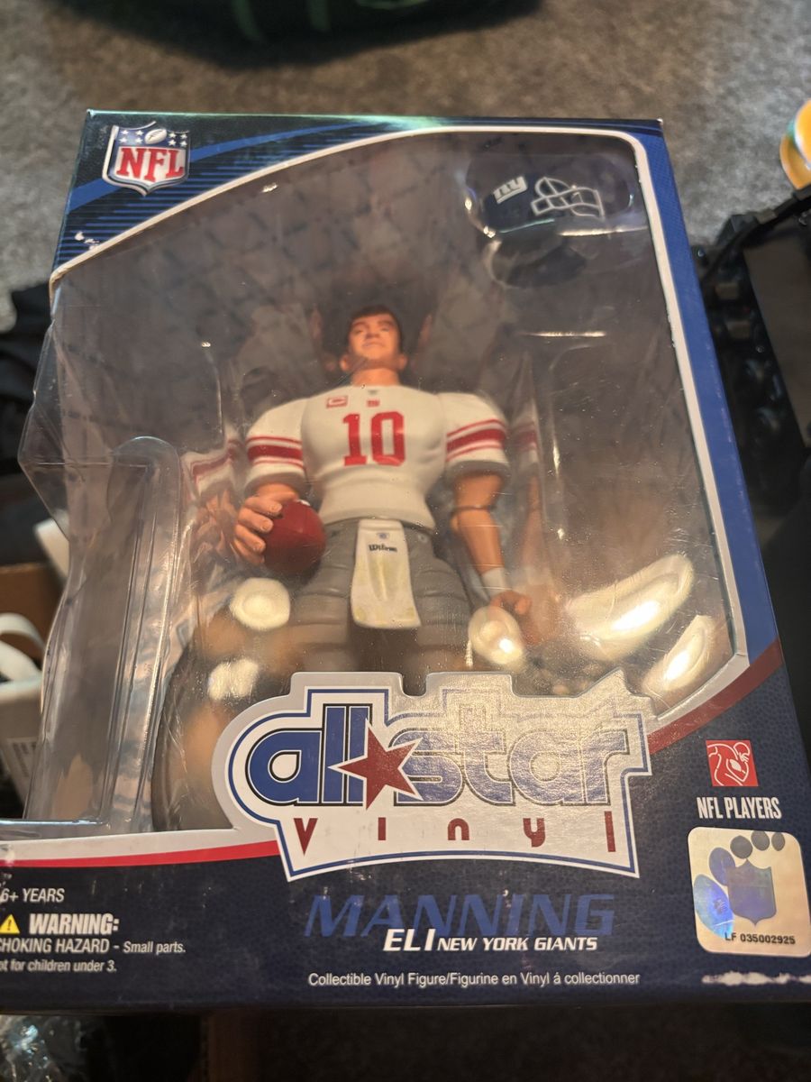 Brand new Eli Manning action figure in box