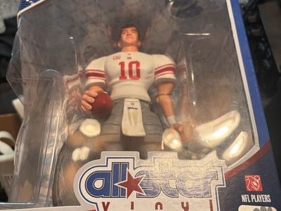 Brand new Eli Manning action figure in box