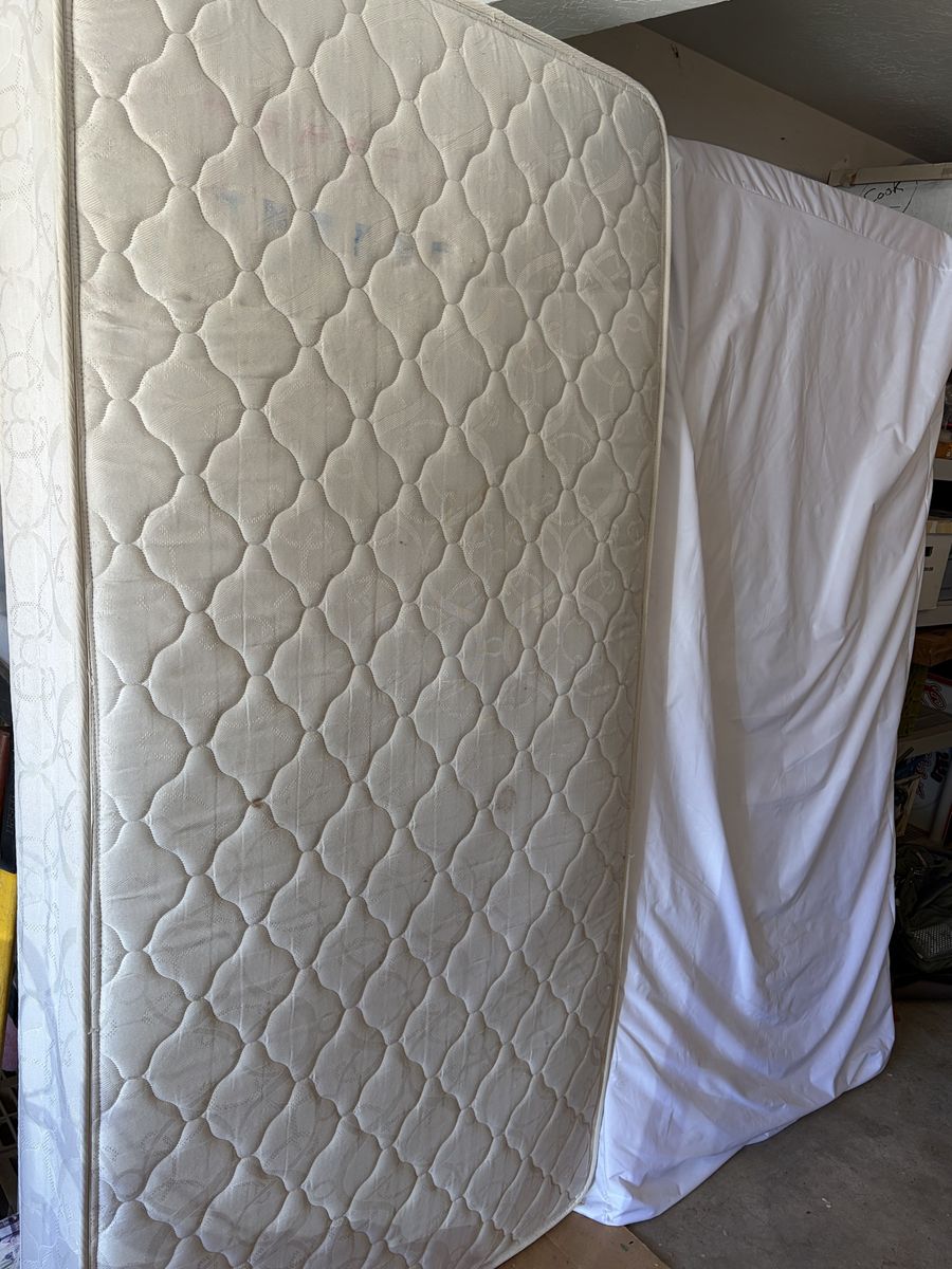 Free 2 twin mattresses and bunk board