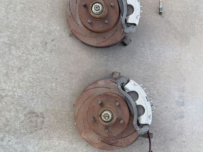 Slotted disc Brake Rotors and Calipers Set.