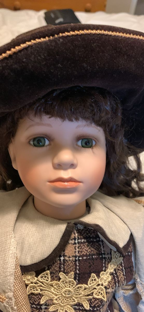 Vintage Porcelain Collector Doll with Brown Coat, Hat, and Matching Teddy Bear
