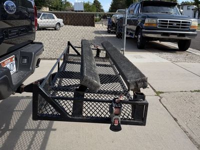 Standup jet ski tow hitch rack