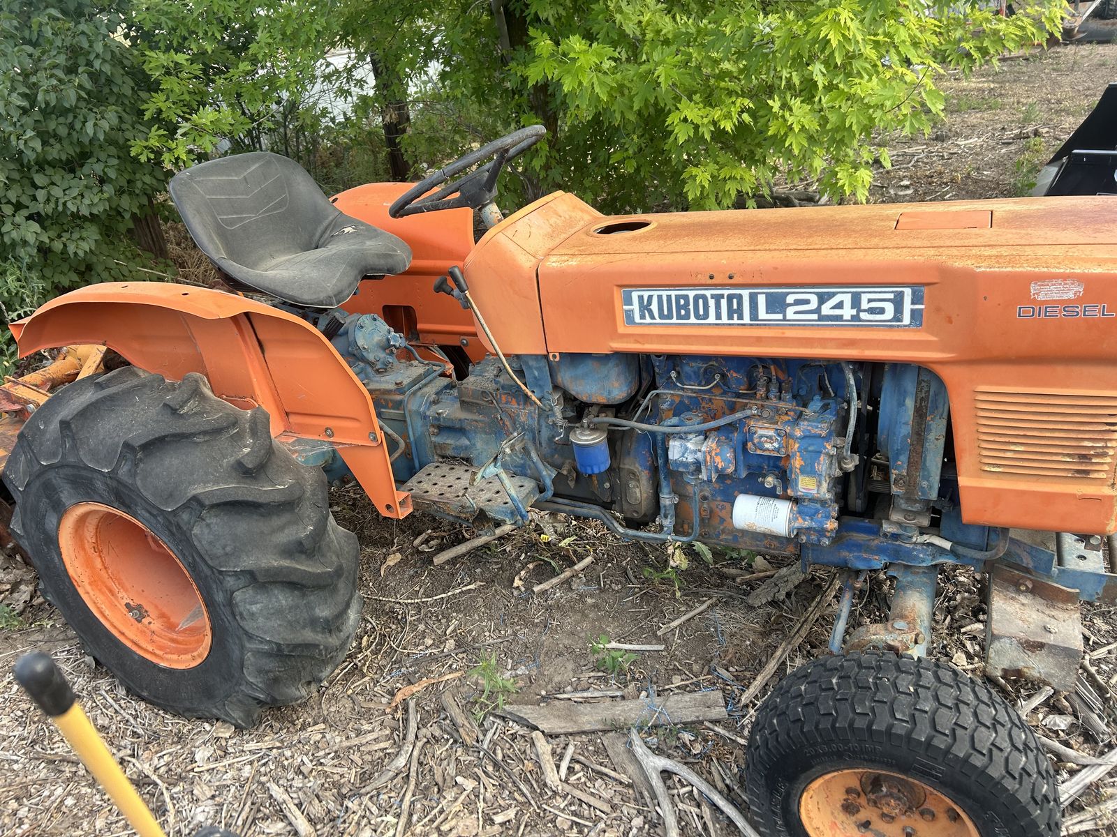 Kubota L245 with rototiller