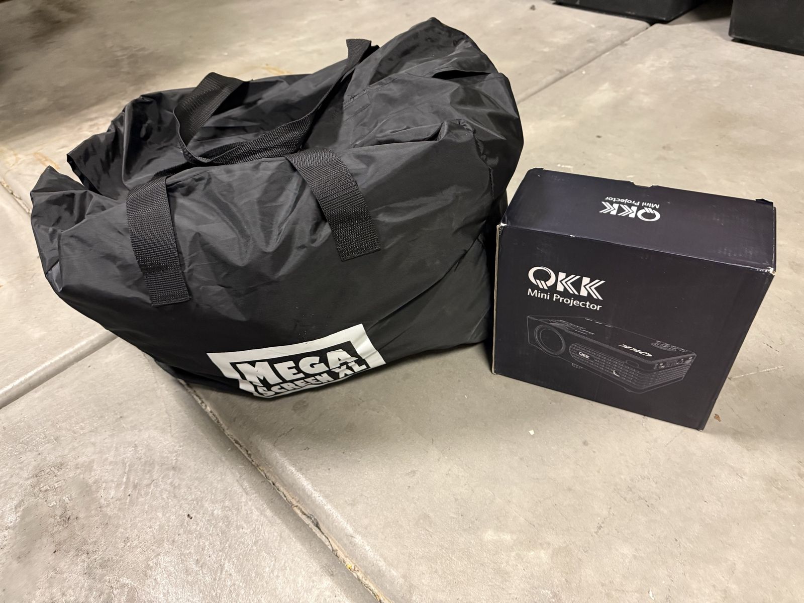 QKK Mini Projector with 14’ inflatable Outdoor/Indoor Screen - used twice